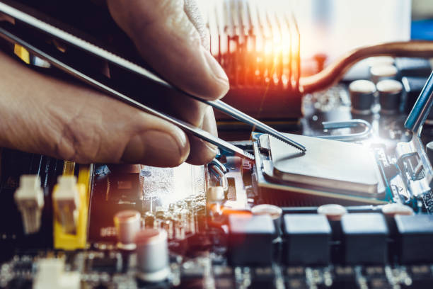 Engineer fixing computer